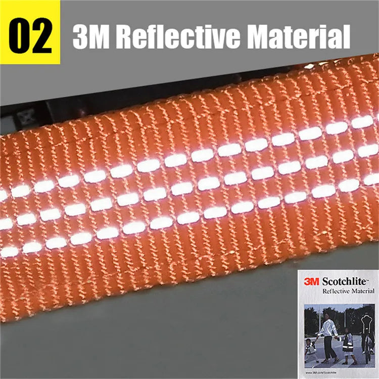 Close-up of orange dog leash with 3M reflective stitching for night safety.